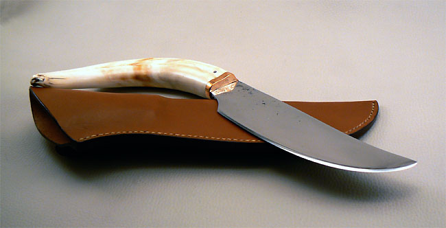 Grand couteau brut de forge, manche en dfense de phacochre